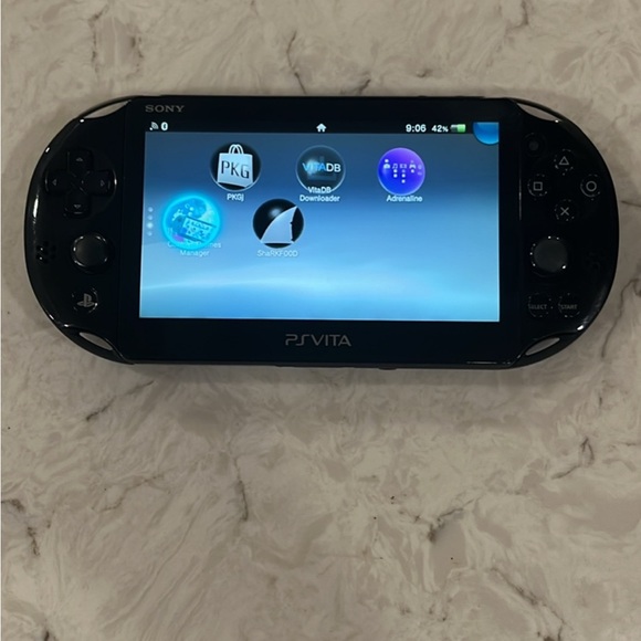 Sony Ps Vita 2001 lots of games - Picture 1 of 3